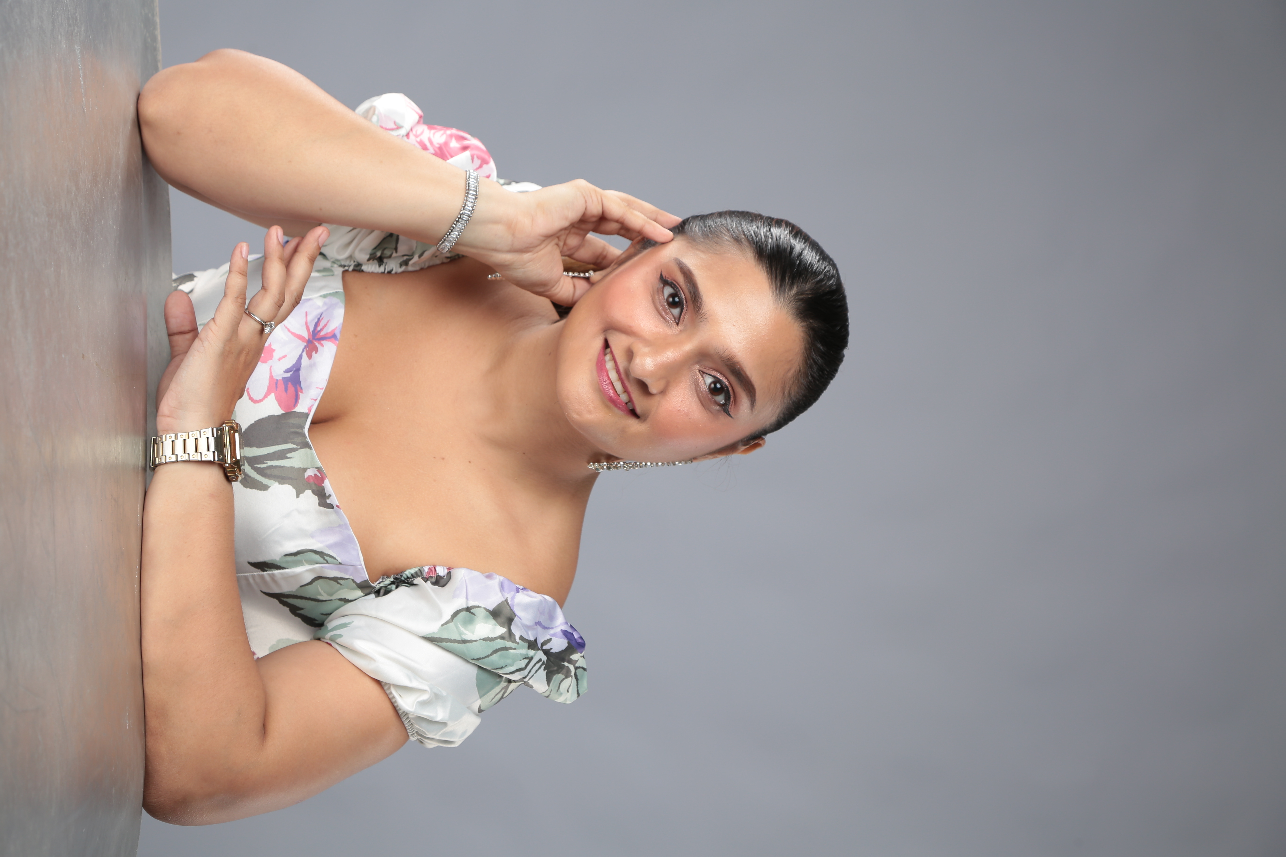 Portrait of Radaba Polo wearing a floral dress